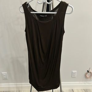 Long blouse, it will cover your bum. Very flattering